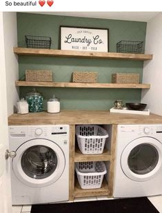 a washer and dryer in a small room with shelves above the washer