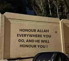 a sign on the side of a building that says, honour allaah everywhere you go, and he will honour you