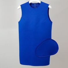 Jacquemus Blue Scuba Sleeveless Dress In Deep Blue Crafted From Structured Neoprene Fabric That Enhances The Silhouette Of The Dress And Features Two Armhole Angled Darts, A Whimsical Front Appliqu Pocket, A Round Neckline, And A Zip Closure At The Back. Size: Fr 36 Condition: Pristine; No Visible Signs Of Wear Approximate Measurements (Laid Flat): Shoulder: 15” (38cm) Chest: 18.5” (47 Cm) Length Down Back: 45” (80 Cm) Composition: 85% Polyester, 15% Elastane. Jacquemus Dress, Neoprene Dress, Blue Crafts, Neoprene Fabric, Scuba Dress, Deep Blue, Round Neckline, Sleeveless Dress, The Dress