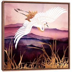 a painting of a white crane flying over mountains in the sky with gold foil on it