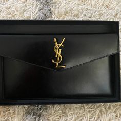 Barely Worn Ysl, Saint Laurent Uptown Pouch Smooth Black Leather 100% Calfskin Leather. Dimensions: 27 X 16 X 2 Cm / 10.6 X 6.2 X 0.7 Great Deal! Price Is Firm Bags Ysl, Red Sandals Heels, Nude Clutch, Envelope Clutch Purse, White Strappy Sandals, Ysl Saint Laurent, Saint Laurent Bags, Red Sandals, Metallic Sandals