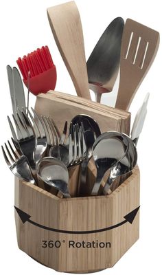 a wooden container filled with silverware and utensils