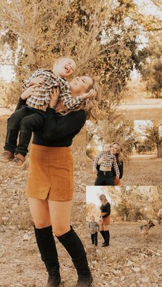 a woman holding a baby in her arms while standing on top of a leaf covered field