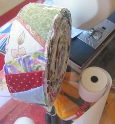 a roll of fabric sitting on top of a table