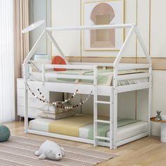 a white bunk bed sitting on top of a wooden floor