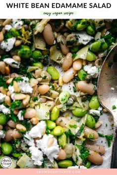 a close up of a plate of food with broccoli, beans and feta cheese