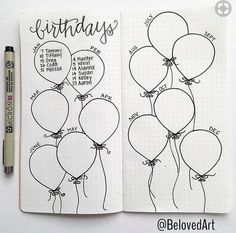 an open notebook with some balloons on it