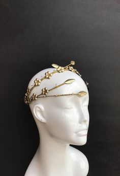 This truly luxurious headpiece made entirely by hand from delicate Italian gold leather. Ornately decorated with an array of beautiful floral appliqués and stunning Swarovski crystal and beads. Extremely light and comfortable to wear.  Looks amazing from any angle! Perfect wether you a wedding guest or a bride herself. Perfect accessory for New Years Eve party! Created for powerful goddess in mind.  Wear yours with confidence. Wedding Floral Crown, Boho Wedding Crown, Powerful Goddess, Swarovski Tiara, Leather Crown, Floral Crown Wedding, Crystals Wedding, Wedding Halo, Crystal Bridal Tiaras