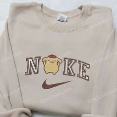 Introducing the Pompourin x Nike Embroidered Sweatshirt, a unique collaboration that combines the cuteness of Pompourin and the sporty vibe Nike Embroidered Sweatshirt, Pretty Casual Outfits, Nike Inspired, Nike Clothes, Hello Kitty Things, Maroon Hoodie, Sanrio Stuff, Kawaii Things, Custom Nike