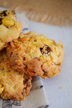 three cookies sitting on top of a napkin