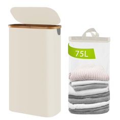 the white laundry bag is next to some folded clothes and a brown box with an open lid