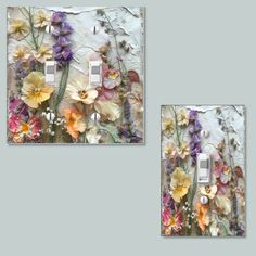 two light switch covers with flowers on them