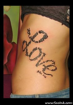 a woman's stomach with the words written in cursive writing on it