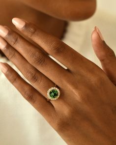 DetailsMaterial: 14k/18k GoldColor Options: Yellow Gold, White Gold, Rose Gold,★ Center Stone:Green Tourmaline, RoundSize: 8 mmApprox Weight (Ct): 1.95★ Accent Stones:Diamond RoundSize: 2 mm * 7 Nos, 1.5 mm * 10 NosApprox Weight (Ct): 0.385 Green Diamond Rings, Tourmaline Engagement Ring, Green Tourmaline Ring, London Blue Topaz Ring, Natural Gemstone Jewelry, 18k Gold Ring, Green Diamond, Tourmaline Ring, Dream Ring