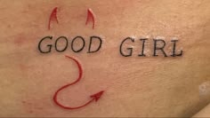 a woman's chest with the words good girl painted on it and arrows pointing up