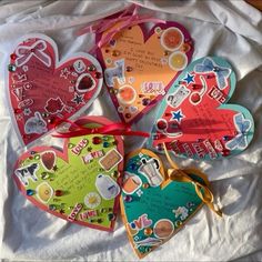 four heart shaped valentine's day cards tied together