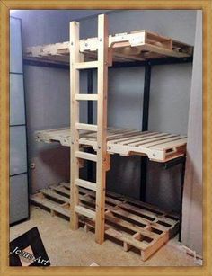 a wooden bunk bed sitting in a room next to a wall