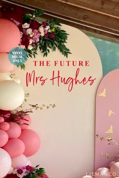 balloons and flowers are on display in front of a sign that says the future mrs - hughes