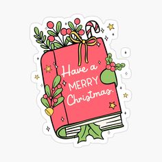 a pink christmas book with holly leaves and bows on the front sticker is shown