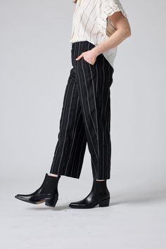 Our famous wide-leg style now in new bold stripe. These pants are a standout yet comfortable pair. Style with your favorite blouse or top for a bold and influential look. Classic Blazer, Bold Stripes, Wide Leg Pant, Fashion Help, Personal Stylist, Black Stripes, Black Pants, Wardrobe Essentials, Wide Leg Pants