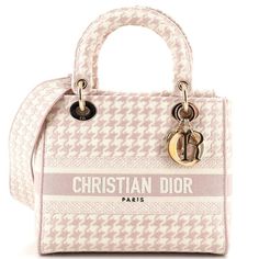 These Are Professional Pictures Of The Actual Item Offered By Rebag. Estimated Retail Price: $4,900 Condition: Great. Light Wear On Exterior, Handles And Strap, Creasing On Strap. Small Glue Stain Underneath Flap, Scratches On Hardware. Accessories: Dust Bag, With Strap Measurements: Height 8", Width 9", Depth 4" Designer: Christian Dior Model: Lady D-Lite Bag Houndstooth Canvas Medium Exterior Material: Canvas Plain Exterior Color: Pink Interior Material: Canvas Plain Interior Color: Pink Hardw Dior Houndstooth, Lady D Lite Bag, Christian Dior Logo, Lady D, Dior Logo, Dior Book Tote, Medium Handbags, Dior Handbags, Pink Interior