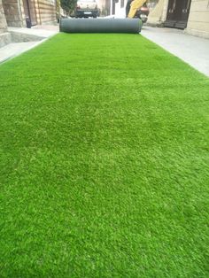 the grass is green and ready to be used as a lawn edging material for landscaping