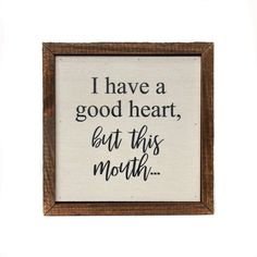 a wooden framed sign with the words i have a good heart, but this month