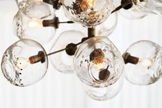 a chandelier with glass balls hanging from it