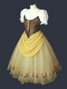 a dress made to look like a woman's costume with yellow and brown trims