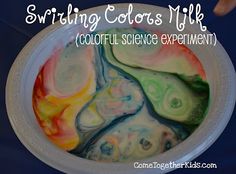 someone is holding a paper plate with colorful designs on it and the words, swirling colors milk