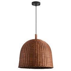 a brown rattan light hanging from a ceiling fixture with an iron rod and black metal fittings