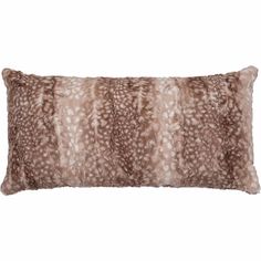 a brown and white animal print pillow on a white background