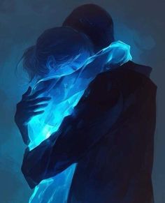 two people hugging each other in the dark with blue light coming from behind them and their arms wrapped around one person's shoulders