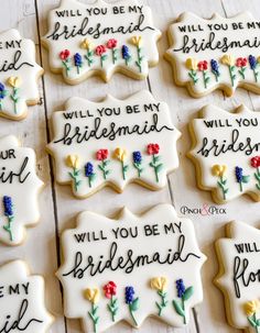 decorated cookies that say will you be my bridesmaid?