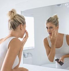 Woman Looking in the Mirror Trying to Look Younger Woman Looking In The Mirror, Lined Lips, Everyday Natural Makeup, Natural Aging Skin Care, Spray Tan Solution, Looking In The Mirror, Natural Everyday Makeup, Natural Makeup Look, Soft Makeup Looks