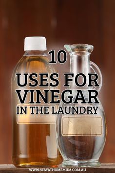 two bottles of vinegar sitting next to each other on top of a wooden table with the words 10 uses for vinegar in the laundry