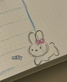 a drawing of a bunny with a pink bow on it's head and the words nifty written below