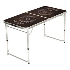 two folding tables with writing on them and one has a wooden table top that is white