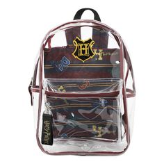 Whether you’re off to a day at the theme park or just headed work, do so with this Harry Potter clear backpack! Made of clear PVC, this backpack has been custom designed with a rubber applique of the Hogwarts crest. Measuring 16 inches in height, this backpack is the perfect size for carrying your most important essentials comfortably. The metal top zipper ensures easy access to the spacious main compartment, where you’ll find a detachable zipper pouch ideal for storing your most valuable posses Back To School Plastic Backpack, Back To School Plastic Standard Backpack, Back To School Standard Plastic Backpack, Standard School Backpack In Plastic, Plastic Standard Backpack For School, Clear Backpack For Back To School, Themed Student Backpack, Back To School Clear Backpack, Back To School Clear Backpack For School