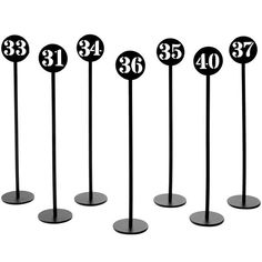 the number twenty seven stands are numbered in black and have numbers on each one side