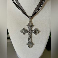 Statement Floral Cross Pendant On A Black Ribbon Necklace. Add A Touch Of Gothic Beauty To Your Look With This Vintage-Style Silver Tone Cross Necklace. The Necklace Features A Charming Floral Design And A Big Punk Cross That Hangs On An Adjustable Black Ribbon. Perfect For Any Occasion, This Necklace Is Ideal For Engagement, Wedding, Anniversary, Birthday, Christening, Confirmation/Communion, Valentine's Day, Father's Day, Mother's Day, Christmas, Graduation, Or Just For Yourself. The Necklace Adjustable Silver Cross Pendant Jewelry, Silver Cross Pendant Jewelry For Party, Silver Cross Necklace For Party, Black Cross Pendant Necklaces For Party, Silver Cross Pendant Necklace For Party, Silver Cross Jewelry For Party, Spiritual Silver Necklace For Parties, Black Cross Pendant Necklace For Party, Adjustable Silver Cross Necklace