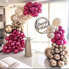 balloons are arranged in the shape of trees on display at a birthday party for someone's special occasion