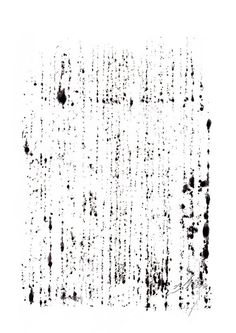 black ink splattered on white paper