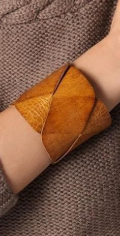 "Get a statement piece! A cuff that would stand out! combining a clean and a Boho look.  Rich leather, all natural dyes and process handmade by artisans in Morocco. Measures: Women's leather cuff, braided pattern 2.75\" wide ,8\"-8.5\" long when closed , two snaps adjustment" Art Du Cuir, Diy En Cuir, Handmade Leather Jewelry, Boho Cuff, Braid Patterns, Handmade Leather Bracelets, Leather Jewellery, Braided Leather Bracelet, Leather Cuffs Bracelet