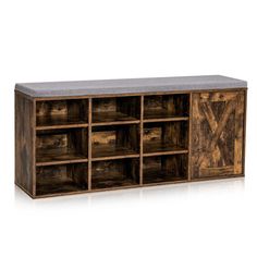 a large wooden cabinet with many compartments