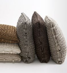 four pillows stacked on top of each other