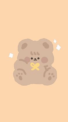 a brown teddy bear with a yellow ribbon around its neck