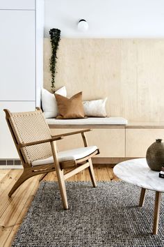 a living room filled with furniture and pillows