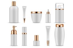 a set of white cosmetic bottles with gold rims