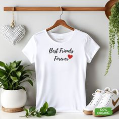 Celebrate the unbreakable bond of friendship with this charming Best Friends T-shirt.  Crafted from soft and breathable cotton, this tee is as comfortable as it is stylish. The vibrant colours and playful design make it a fun and trendy addition to any casual outfit.  Whether you're enjoying a day out with your bestie or looking for a thoughtful gift, this t-shirt is a perfect choice. Let your shirt reflect the special connection you share with your best friend, a symbol of joy and companionship Summer Gift T-shirt With Text Print, White T-shirt For Summer Gift, Mother's Day Gift Cotton T-shirt, Summer Text Print T-shirt For Gift, White Summer T-shirt For Gifts, White Summer T-shirt For Gift, White Summer T-shirt Gift, Casual Tops With Funny Text For Gifts, Cotton T-shirt With Slogan For Gifting